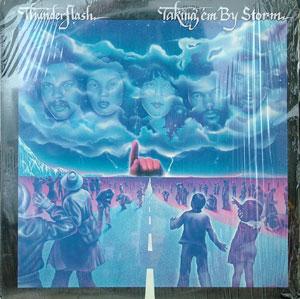Front Cover Album Thunderflash - Taking' Em By Storm Front Cover Album Thunderflash - Taking' Em By Storm