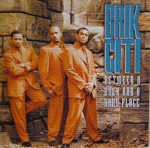 Front Cover Album Brik Citi - Between A Rock And A Hard Place Front Cover Album Brik Citi - Between A Rock And A Hard Place